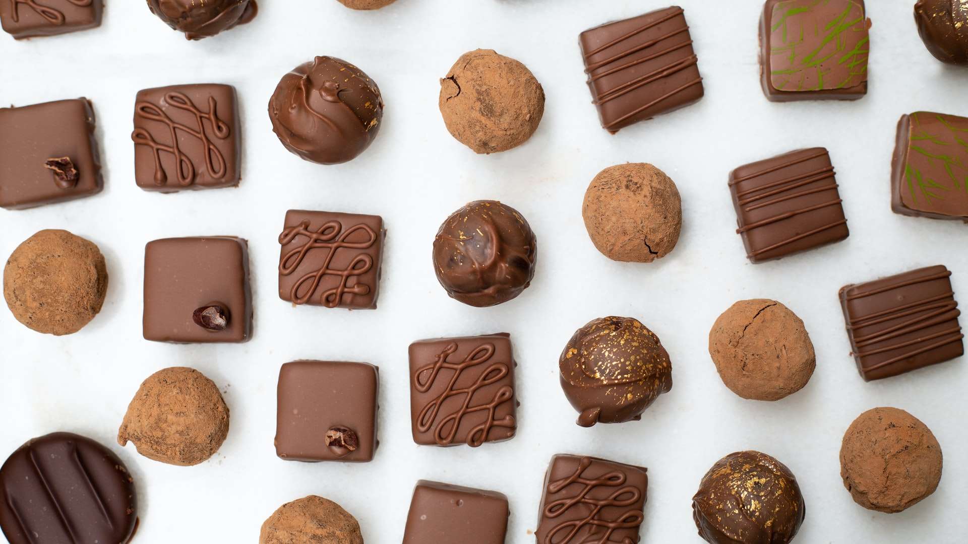 chocolates on a white background to illustrate certification standard